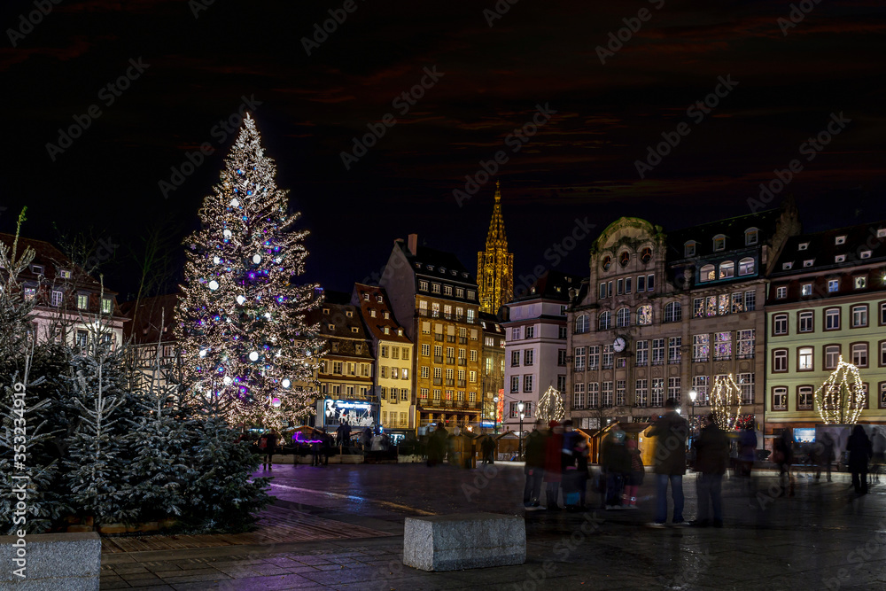 Gigantic Christmas tree in the biggest place of Strasbourg, Kleber place, illuminated during the Christmas season