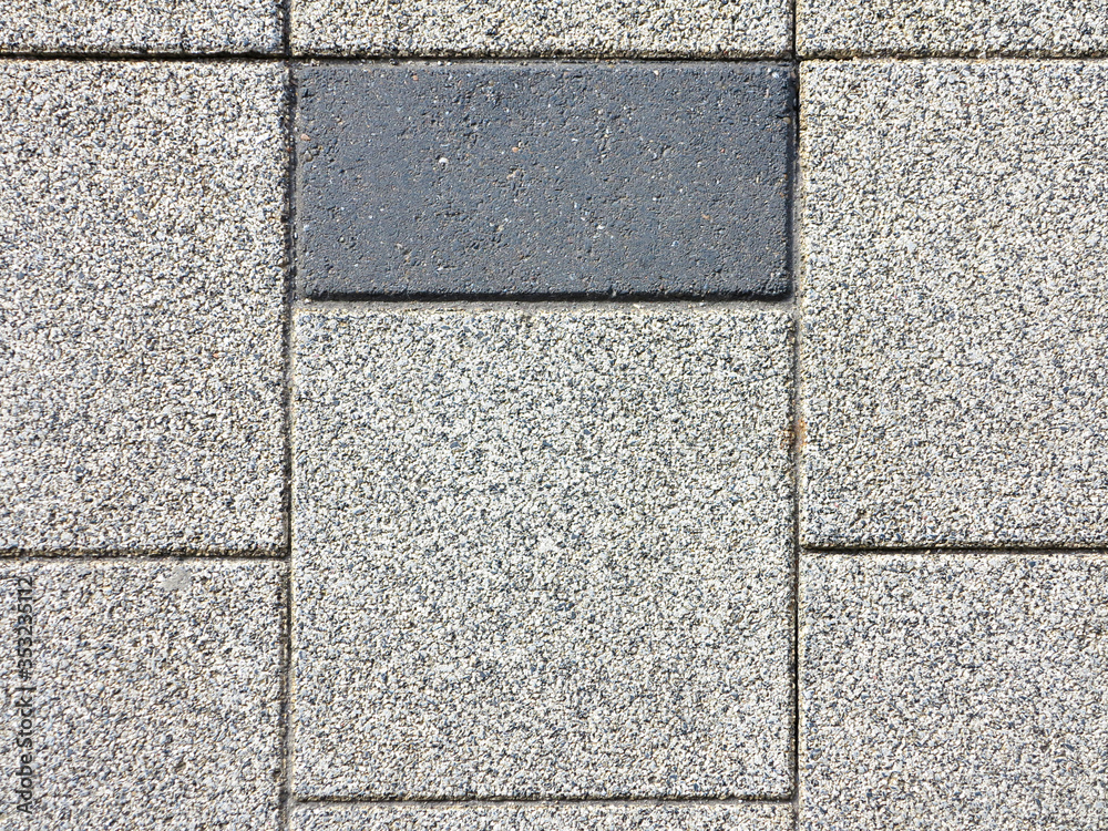 Fototapeta premium Seemingly pattern of grey color concrete road pavement brick of the pedestrian pathway