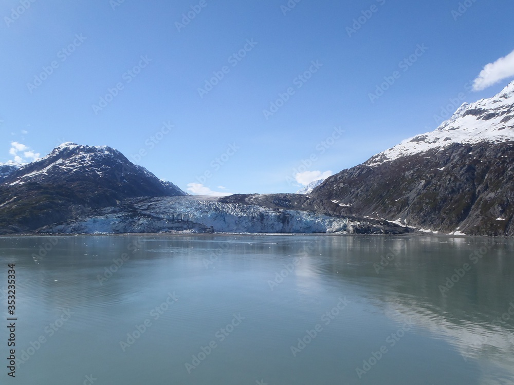 Alaskan glacier canal mountains ice and snow on a sunny blue sky day spring 2018