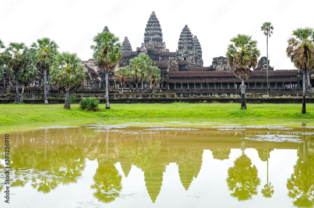 Fototapeta premium Ancient temple complex Angkor Wat, Siem Reap, Cambodia. An ancient Hindu temple complex in Cambodia dedicated to the God Vishnu.