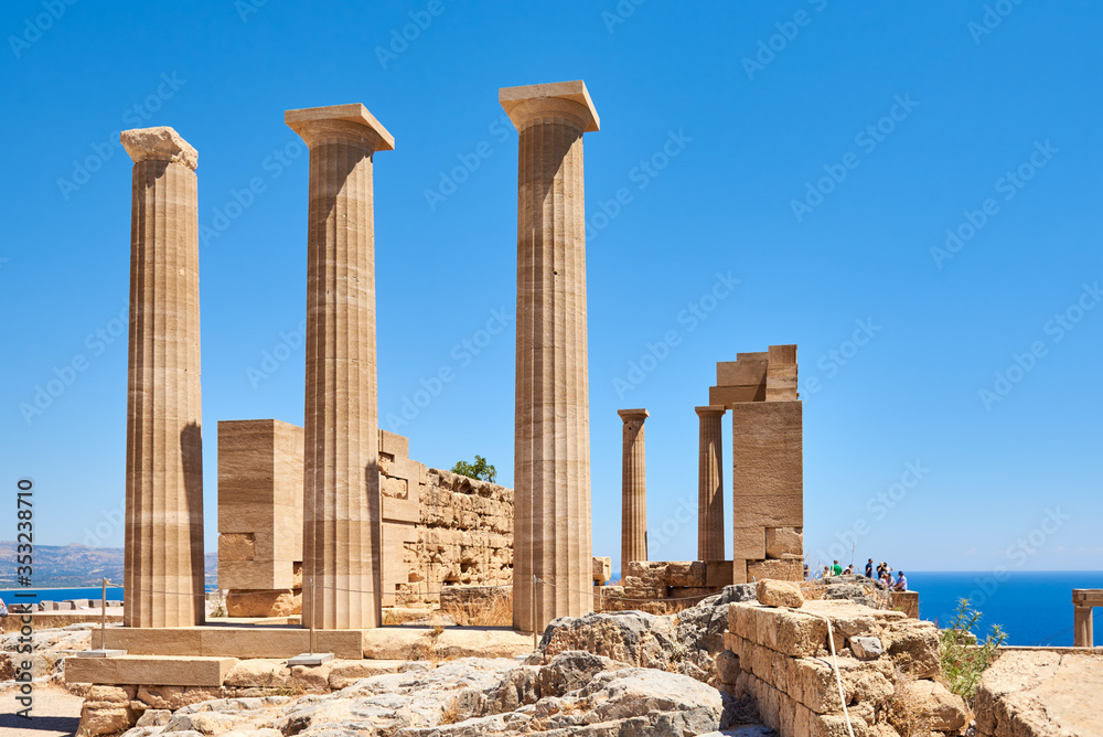 Ancient columns in the acropolis of famous Lindos town in Rhodes