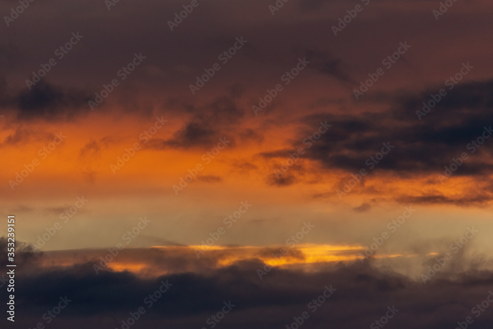 Incredibly beautiful orange sunset. The sky before a thunderstorm