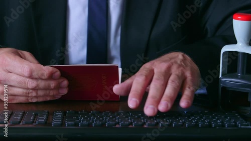 Put a stamp in the passport:  visa approved. passport printing.