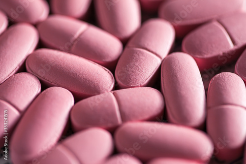 Pink pills. Macro image.