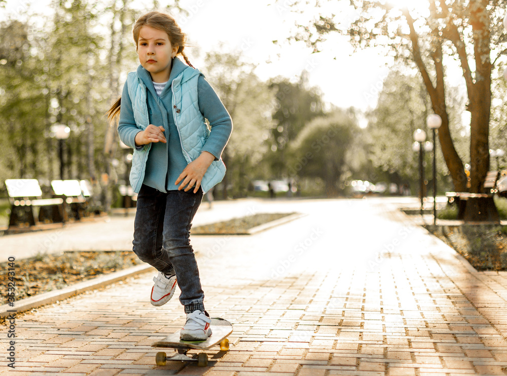 Fototapeta premium young woman walking in the park