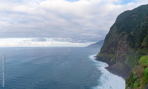 View of waterfalls flowing into the ocean close to Seixal town in Madeira © Karthik