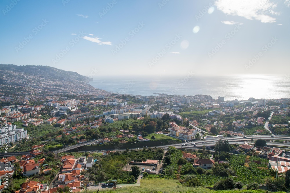 View of Funchal city and the ocean from Pico dos Barcelos lookout point, Madeira