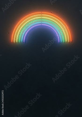 Creative fluorescent color rainbow layout made of neon tubes. Flat lay neon colors. Summer concept. Wall texture dark minimal background.