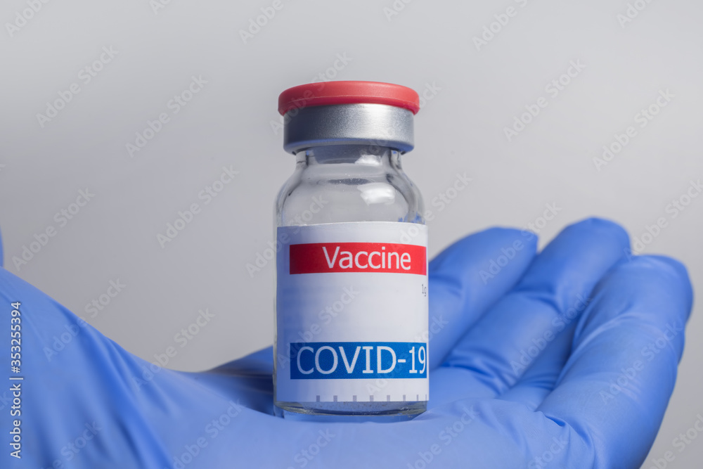 coronavirus vaccine vial in hand coronavirus vaccine vial in hand