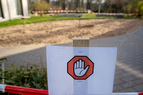 Playground sign closed sun spring stop sign hand