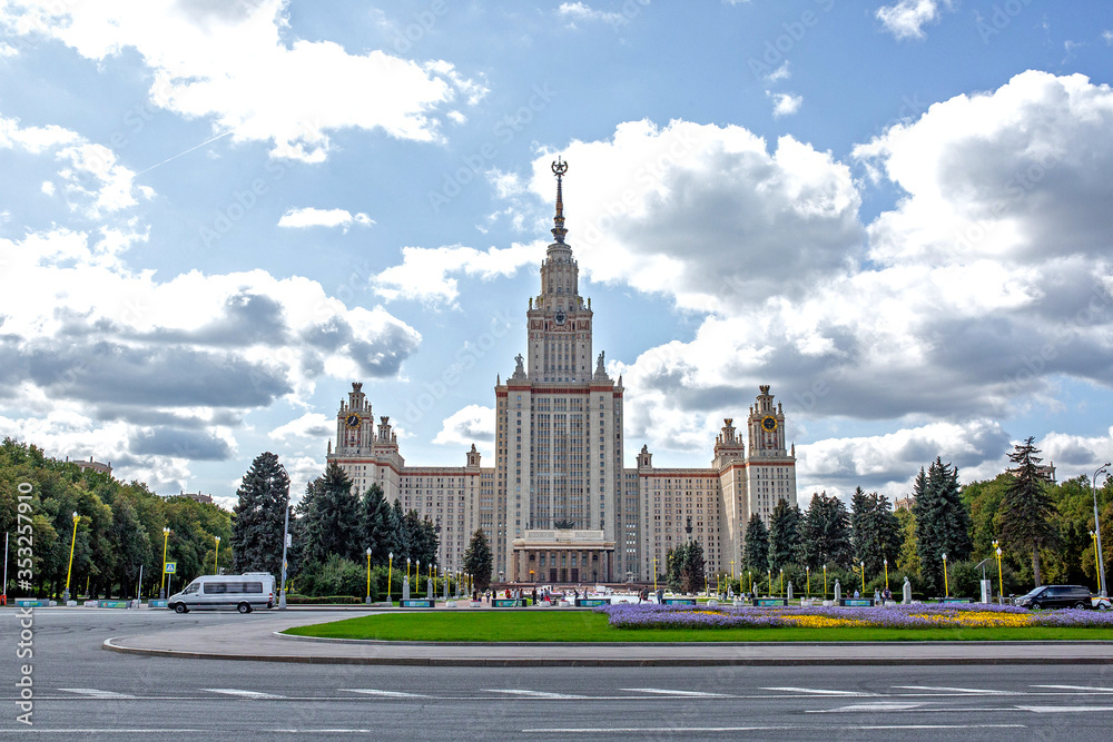 The building of the main higher educational institution in Moscow. Park with tree-lined avenues.