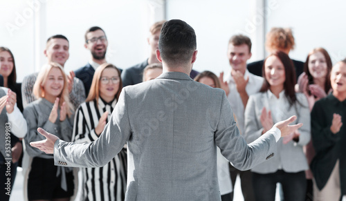 businessman speaking with addressing his business team.