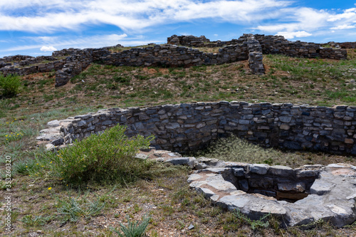 A landscape of Puebloan ruins of what is left of the Salinas Pueblo Missions at the Gran Quivira National Monument in New Mexico.  photo