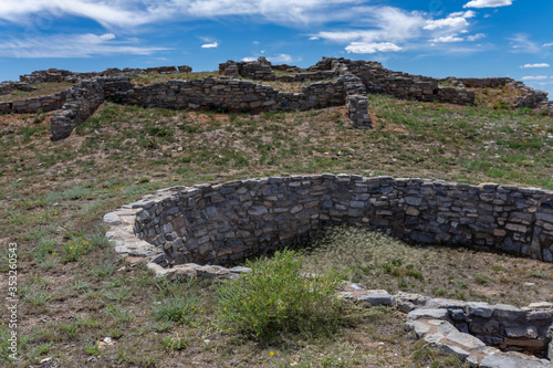 A landscape of Puebloan ruins of what is left of the Salinas Pueblo Missions at the Gran Quivira National Monument in New Mexico.  photo