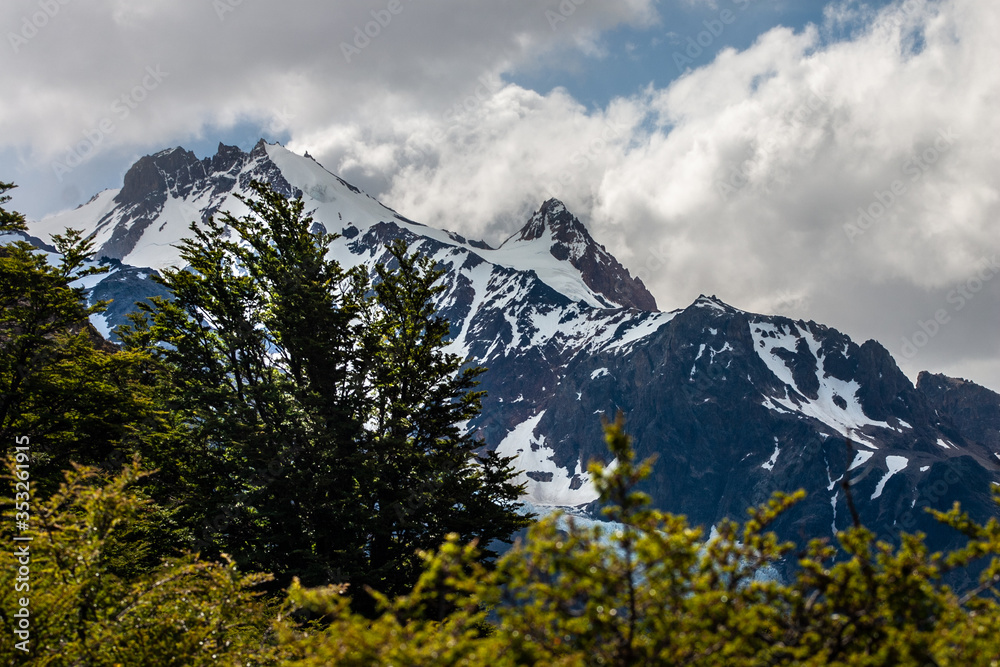 the mountain the peaks and lakes of patagonia argentina, with a sky full of clouds