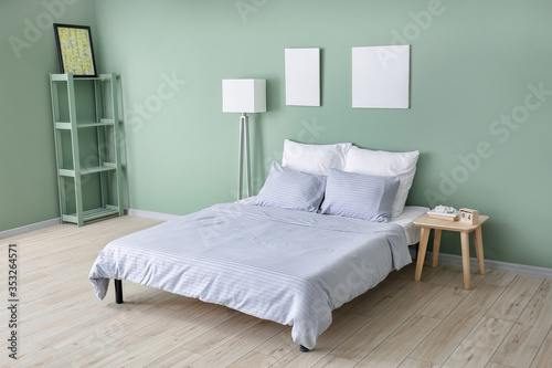 Interior of comfortable modern bedroom