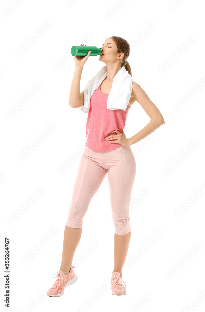 Sporty young woman with water on white background Sporty young woman with water on white background