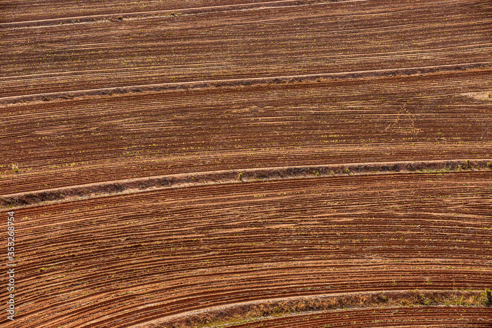 Aerial view of a plowed field ready for sowing. Aerial view of a plowed field ready for sowing.