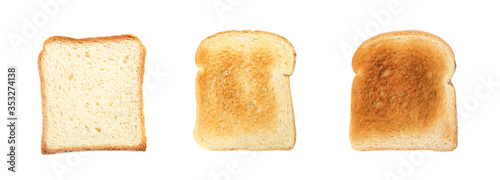 Set with toasted slices of wheat bread on white background, top view. Banner design