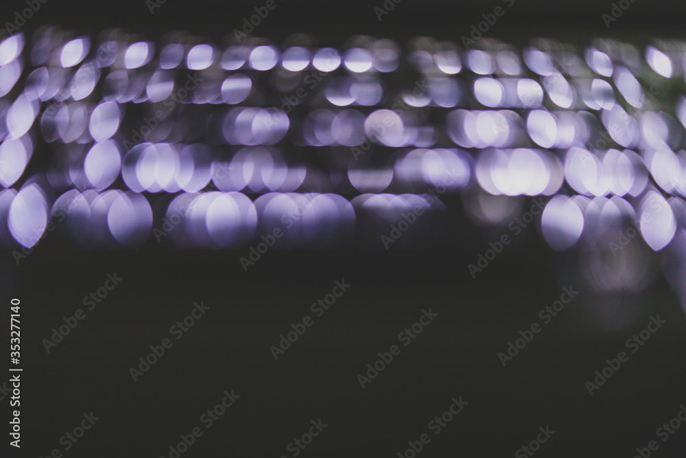 Obraz premium blurred background of backlit keyboard with led light