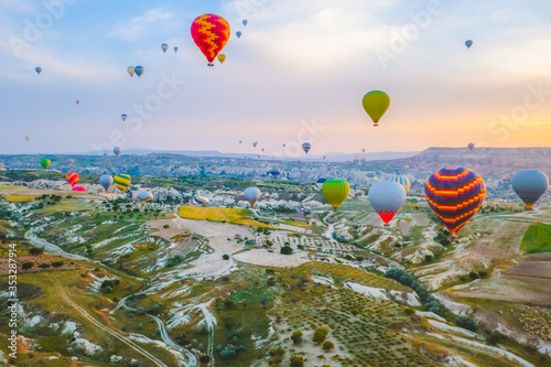 Aerial view of hot air balloons flying over spectacular at Cappadocia, Turkey. Goreme national park.