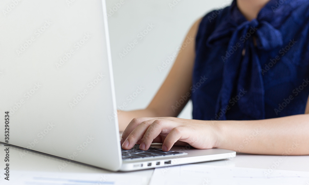 Fototapeta premium Financial businessmen use laptop to analyze marketing strategies and real estate data to reduce company taxes for their customers, Accounting and Tax concept.