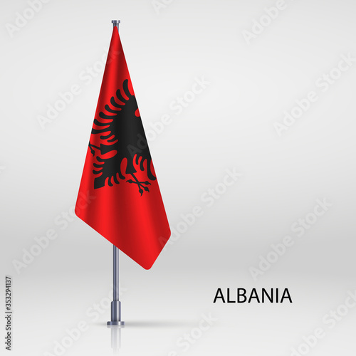albania hanging flag on flagpole