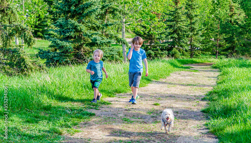 Brothers Walking Their Dog