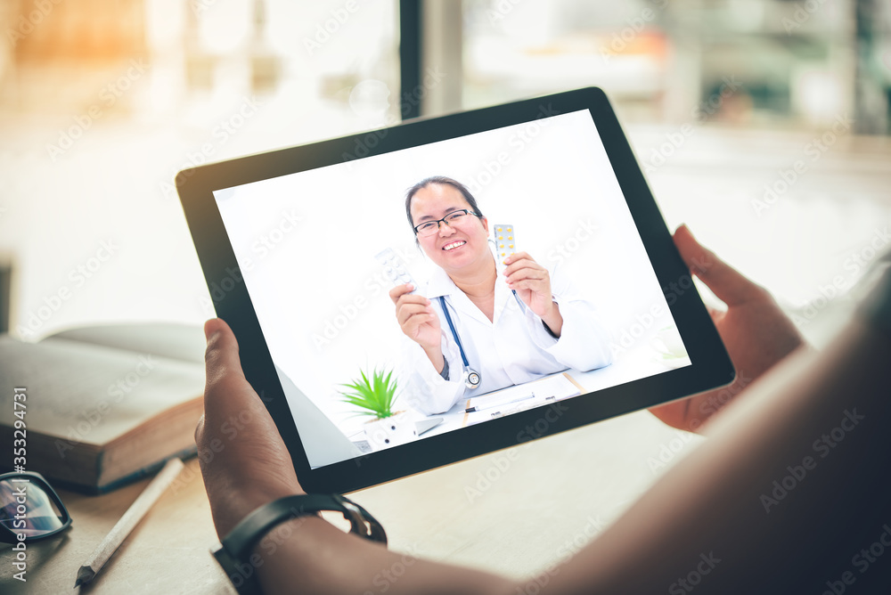 The patient's viewpoint consult with the doctor via social media such as laptop, smartphone, almost. The work for home concept of doctors and patients.