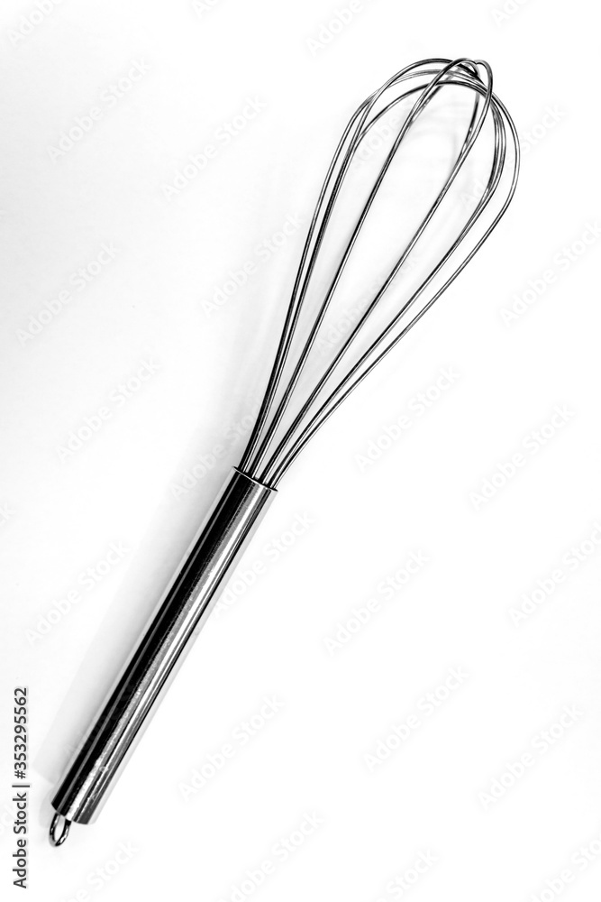 Egg beater on white background Egg beater on white background