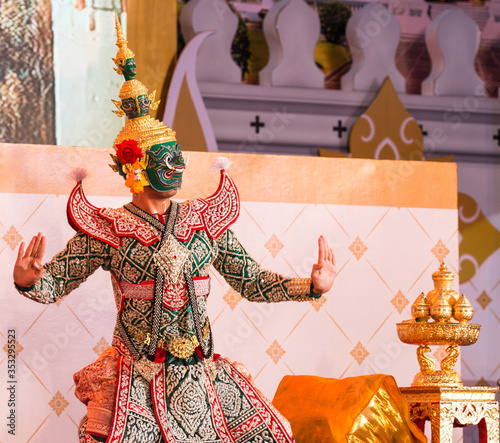 Face mask with traditional thai costume in Bangkok, Thailand photo