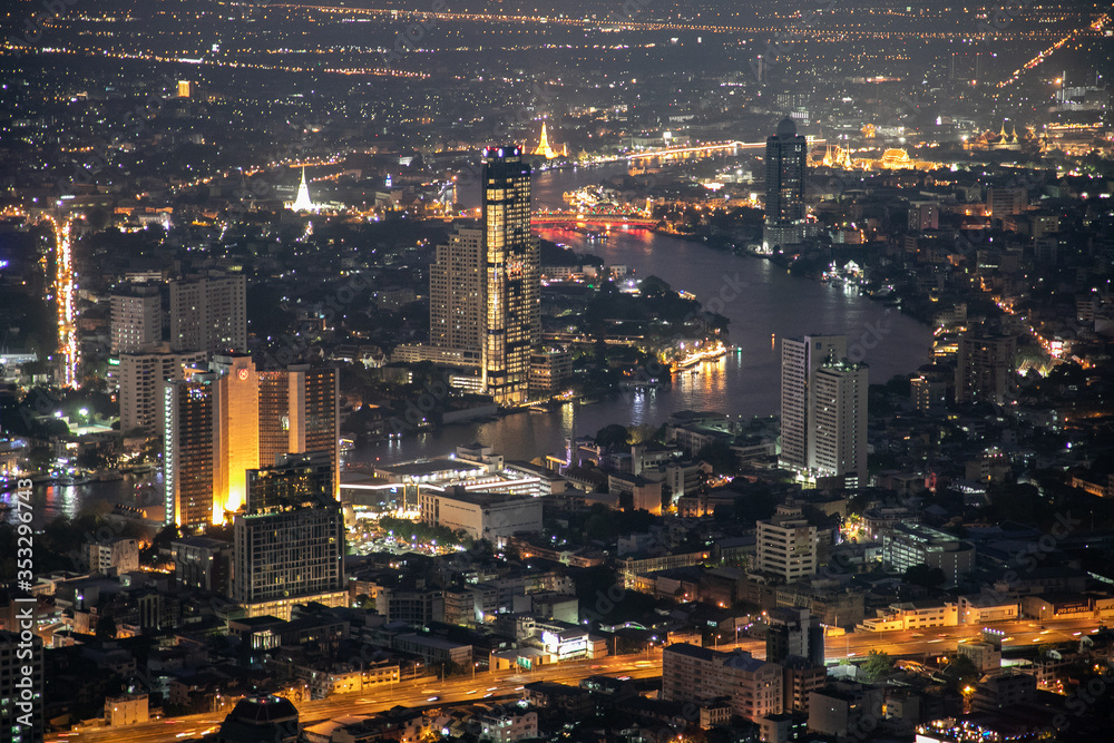 panoramic skyline of Bangkok by night from King Power Mahanakhon, Bangkok, Thailand