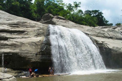 Group pf tourist taking photos and selfies at the Tangadan falls in La Union Pangasinan Philippines