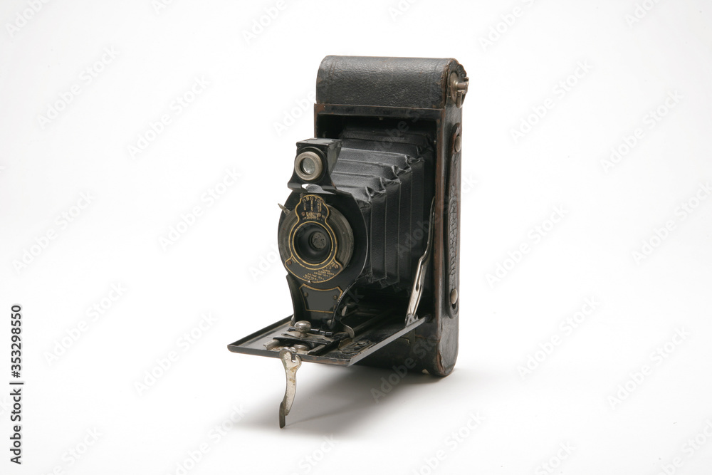 Vintage handheld medium format film camera with black leather bellows