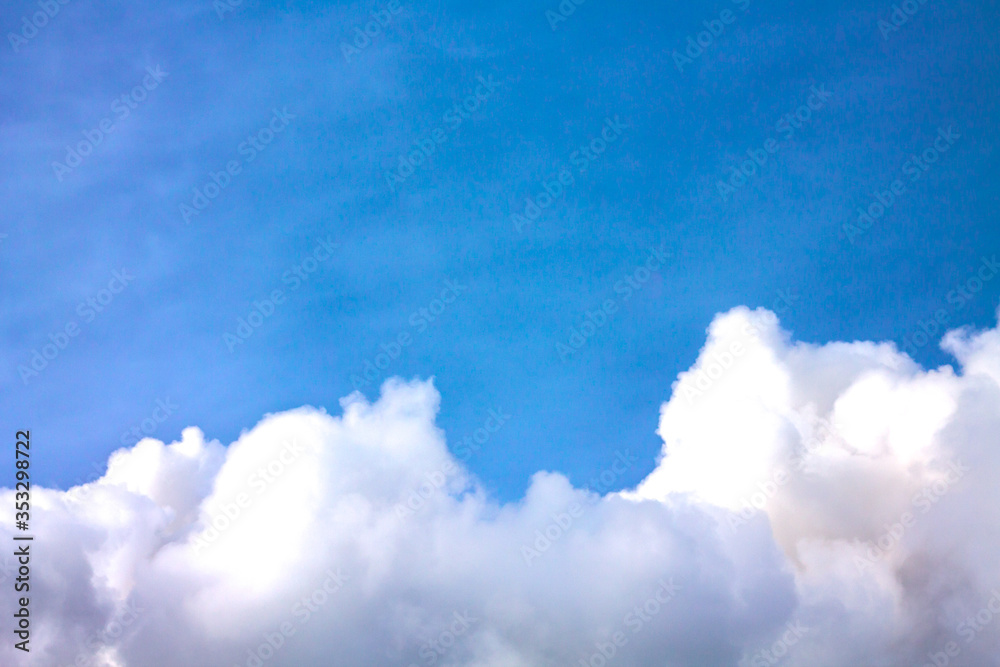Blue sky with beautiful clouds. Cloudy weather. Natural background.