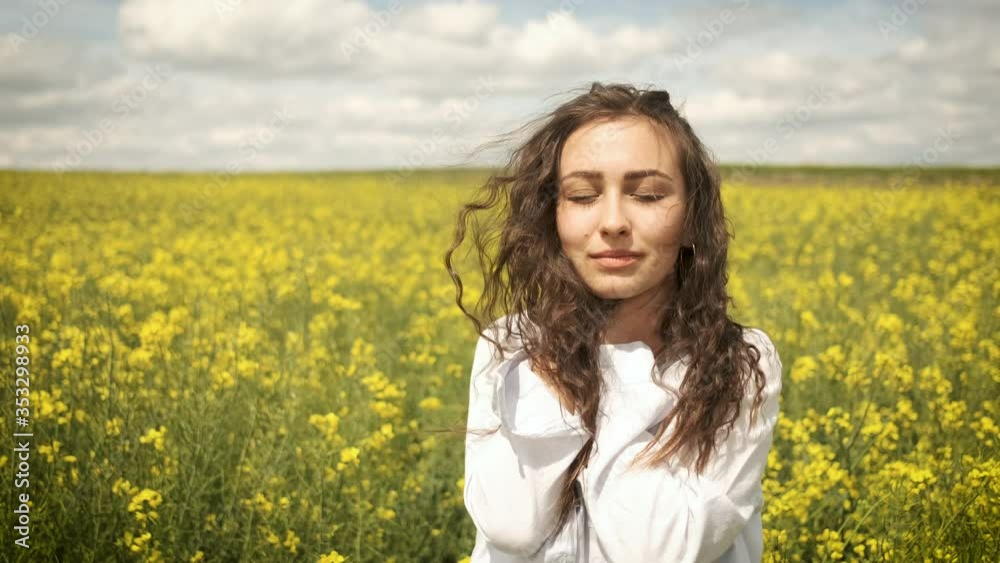 Cheerful girl of Caucasian appearance in rape posing in front of the camera Cheerful girl of Caucasian appearance in rape posing in front of the camera