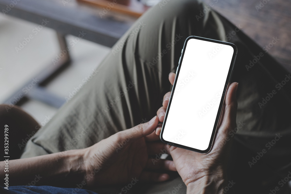 cell phone Mockup image blank white screen.woman hand holding texting using mobile on desk at coffee shop.background empty space for advertise.work people contact marketing business,technology cell phone Mockup image blank white screen.woman hand holding texting using mobile on desk at coffee shop.background empty space for advertise.work people contact marketing business,technology