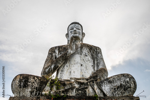 Buddha statue of the temple of Wat Ek Phnom near the city of Battambang in Cambodia