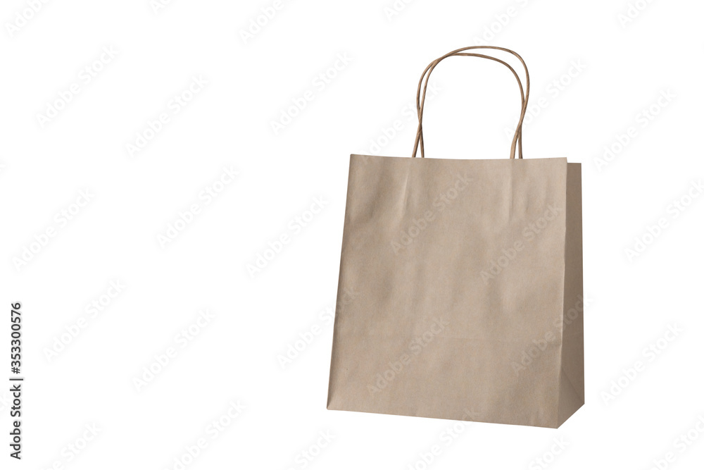 Brown paper shopping bags, isolated on a white background with clipping path Brown paper shopping bags, isolated on a white background with clipping path