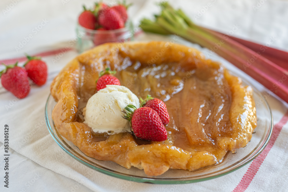 Rhubarb upside down cake with strawberries and ice cream Rhubarb upside down cake with strawberries and ice cream