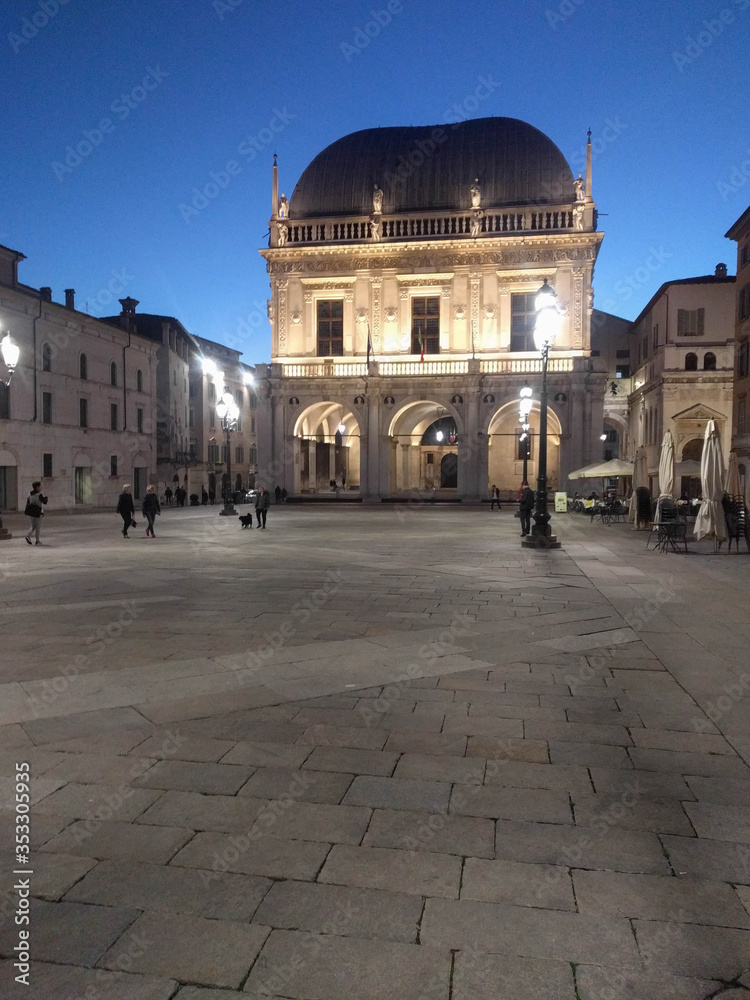 Loggia palace or Brescia City Hall at night, Lombardy, Italy.