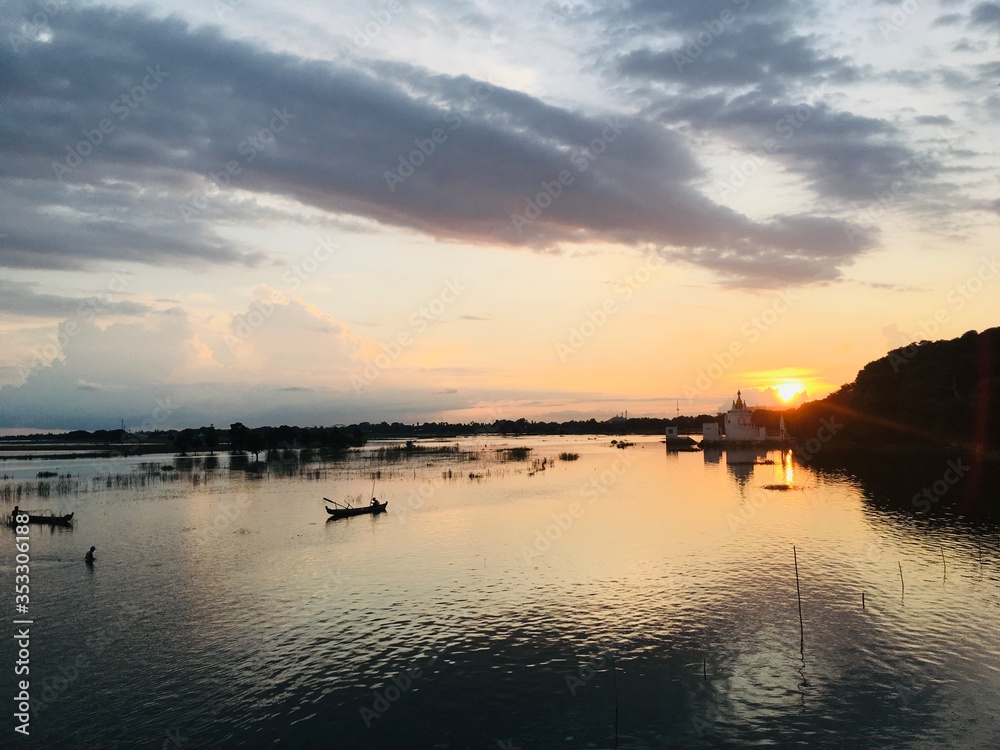 Landscape view on sunset scene twilight sky background at the U Bein Bridge in Mandalay city, Myanmar