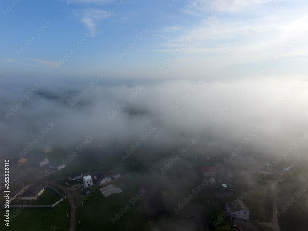Aerial view saburb landscape (drone image). with the morning fog. Near Kiev 