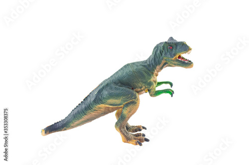 green t-rex Tyrannosaurus plastic toy isolated on white background © sarayutoat