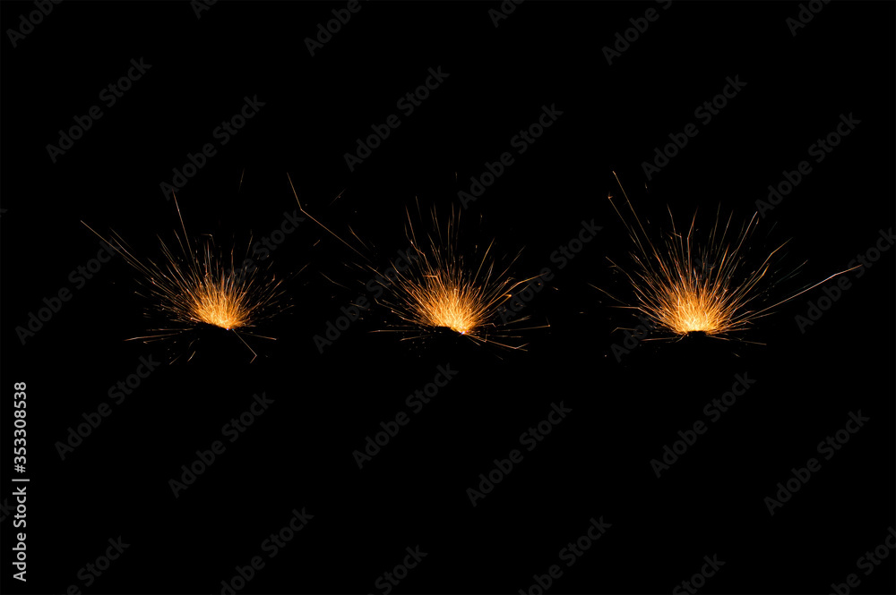 three spark fire on black background three spark fire on black background