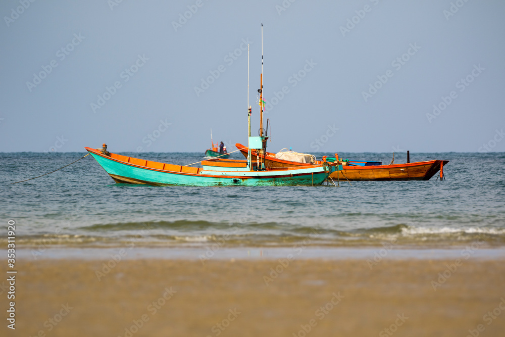 Image of small boat fishing on the sea.