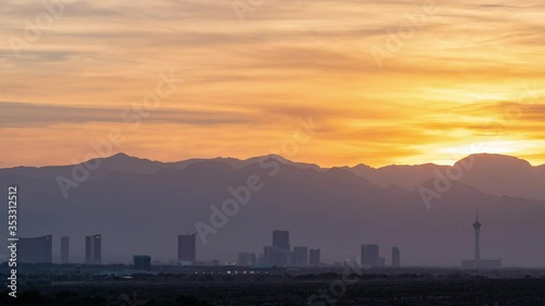 Sunset time lapse of the beautiful strip skyline with red clouds