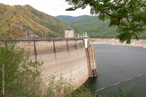 Image of view of bhumibol dam in tak Thailand. Hydro Power Electric Dam and is the first multipurpose dam in thailand and is water storage for agriculture and electricity.. The curved concrete dam.