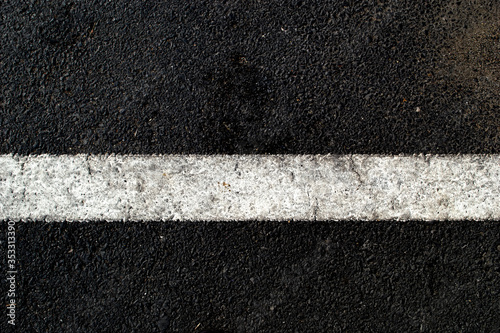 white on asphalt floor in parking