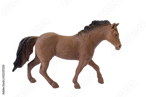brown horse plastic toy isolated on white background